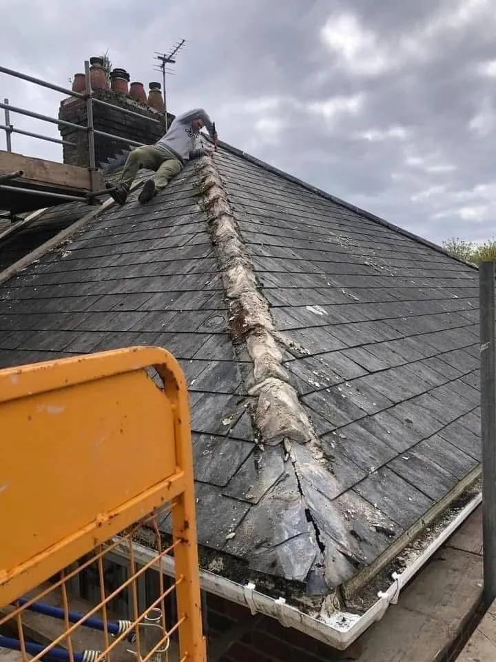 Slate roof ridge and chimney repair in Mousehole
